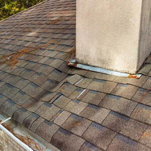 Noblesville Roof Inspector Roof damage around a chimney