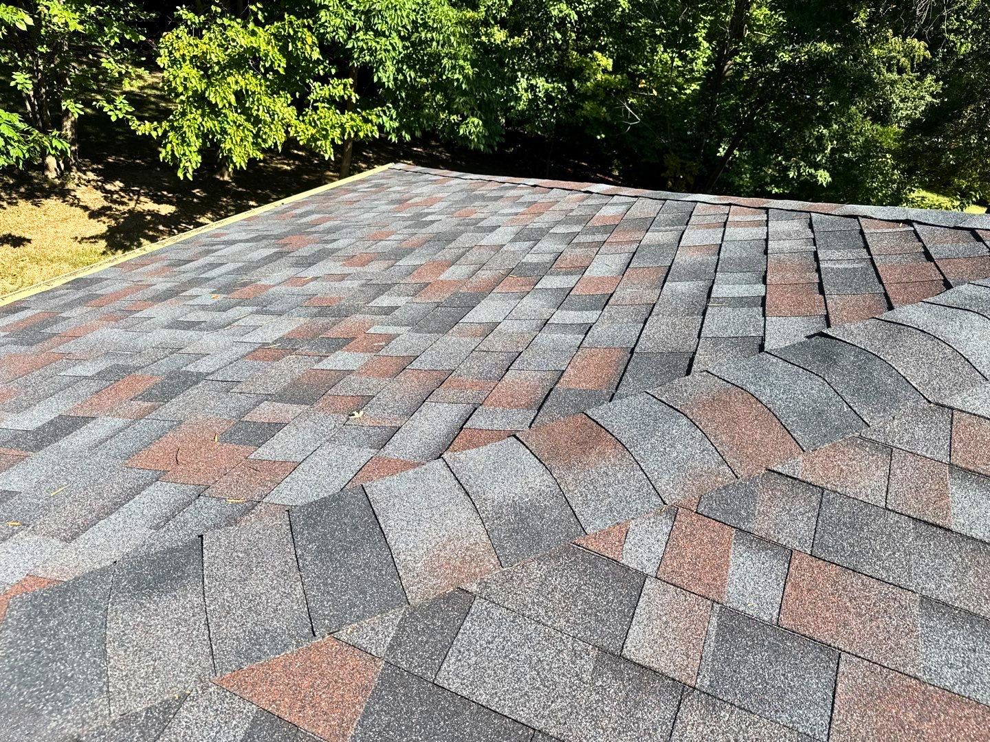 Dimensional asphalt shingles on a Carmel home during a roof inspection by Robert Stevens Roofing